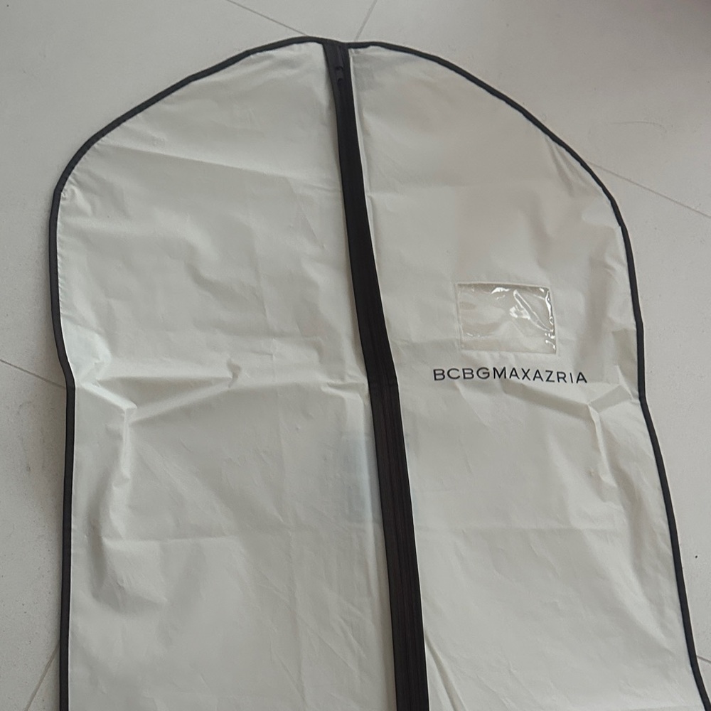 BCBGMaxAzria Cream Garment Bag with dark Trim